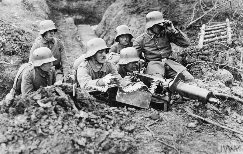 A German machine gun crew, probably of the 18th Infantry Regiment, manning their Maxim machine gun. © IWM (Q 87923)