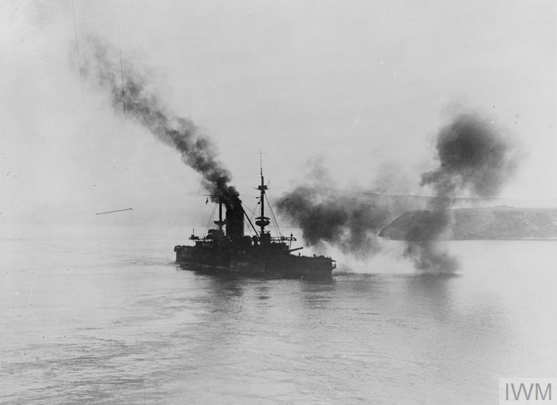 HMS Albion while aground near Gaba Tepe, replying to the Turkish batteries, which shelled her heavily.© IWM (Q 13808)